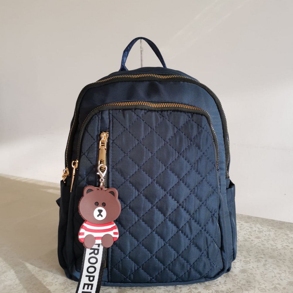 Rucsac fashion albastru din material textil impermeabil cusaturi fine geometrice si breloc fashion cu ursulet ACRD259 Rucsac fashion albastru din material textil impermeabil cusaturi fine geometrice si breloc fashion cu ursulet ACRD259