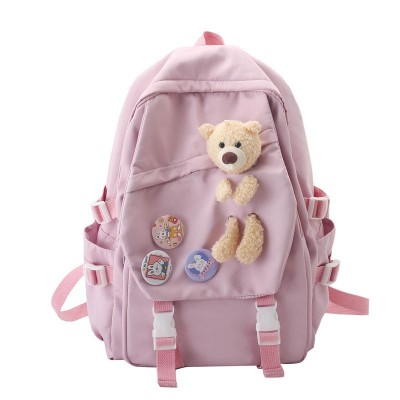 Ghiozdan tip Rucsac roz din material textil impermebail cu buzunare accesoriu insigne si ursulet ACRD375